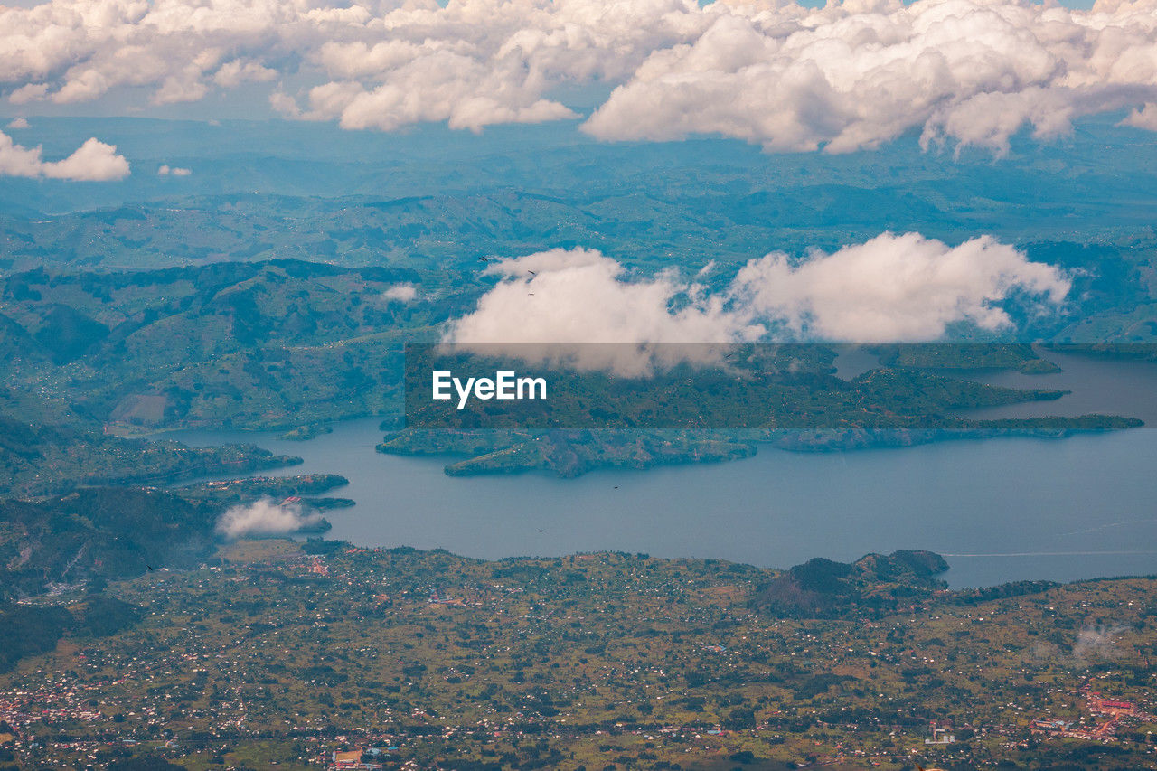 Lake burera in rwanda seen from mount muhabura in the mgahinga gorilla national park, uganda