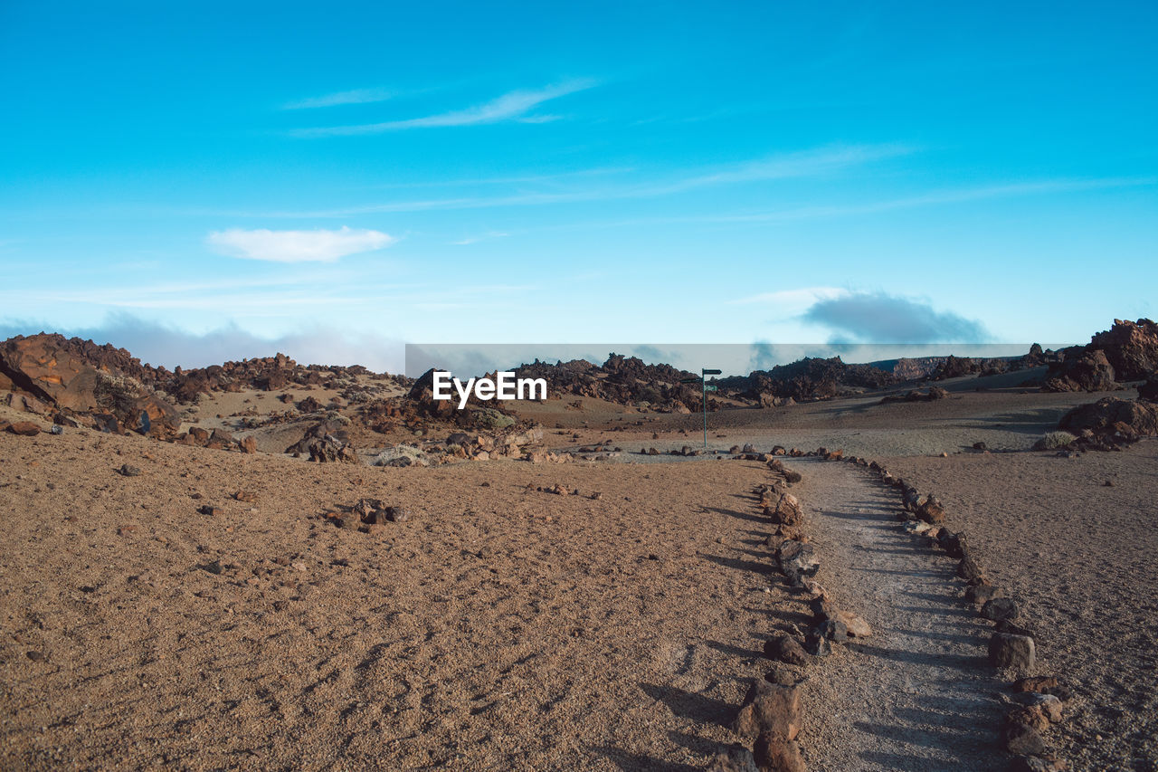 Panoramic view of desert against sky