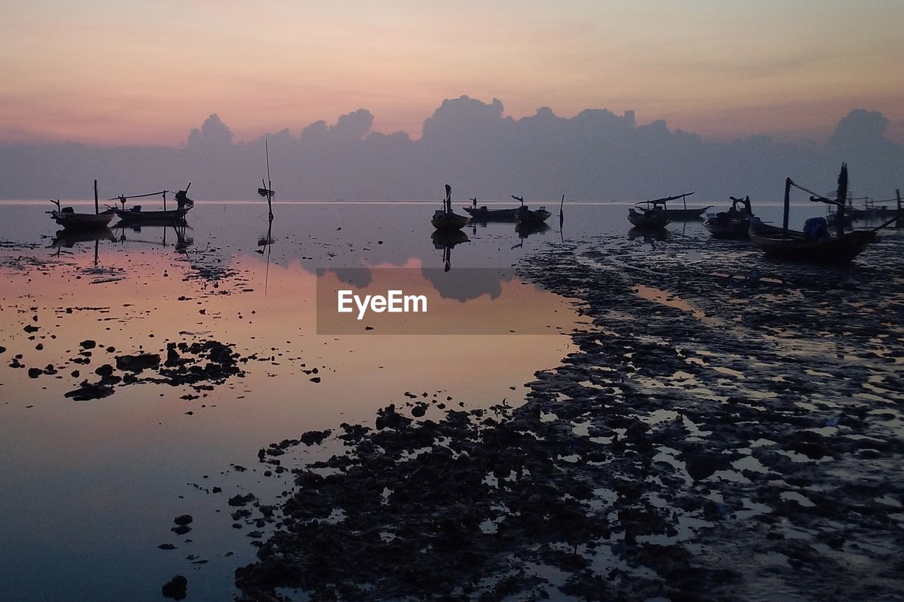Scenic view of sea against sky during sunrise