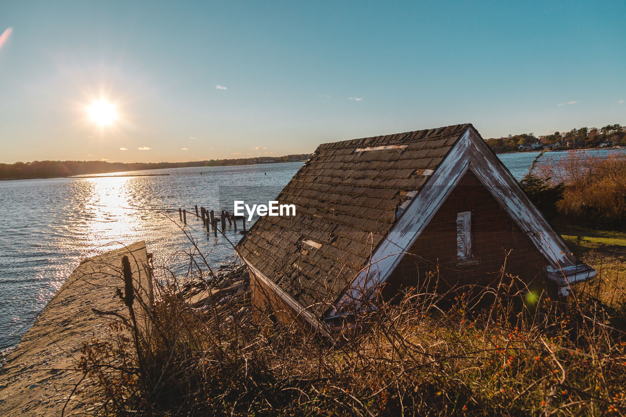 Scenic view of sea against clear sky during sunset