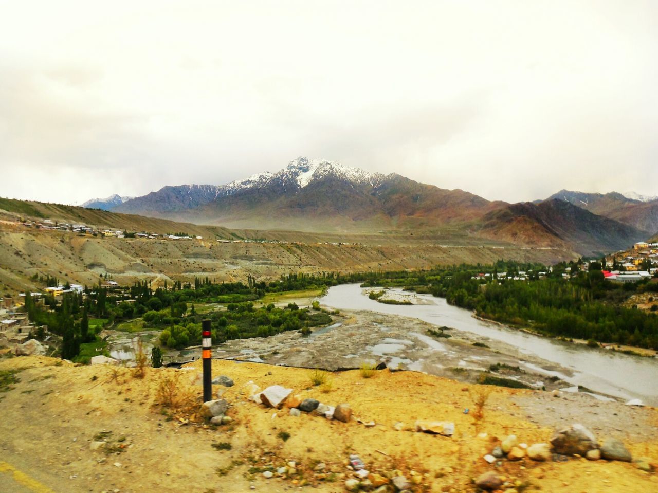 Scenic view of landscape and mountain against sky