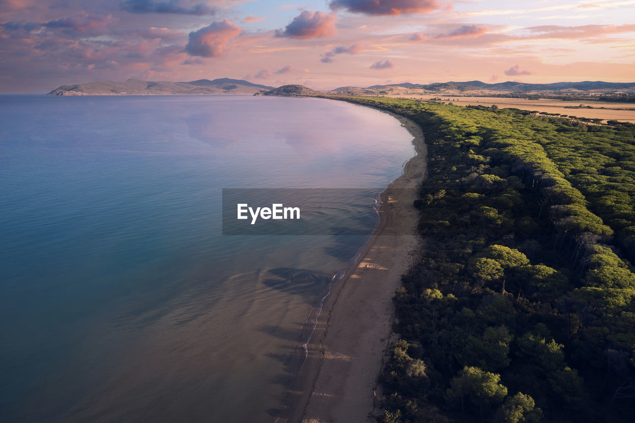 Aerial view of the marine coast leading to talamone in the tuscan maremma