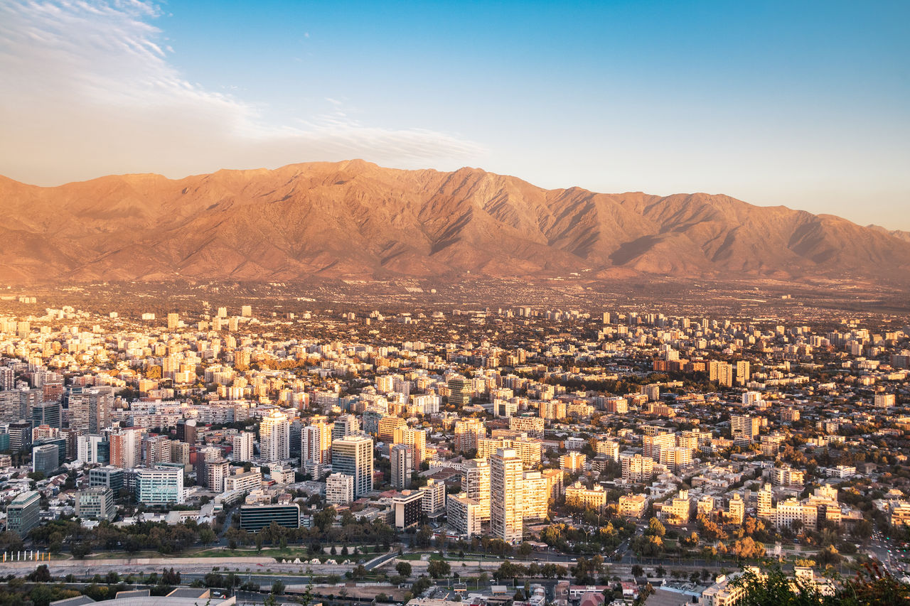 high angle view of townscape against sky during sunset