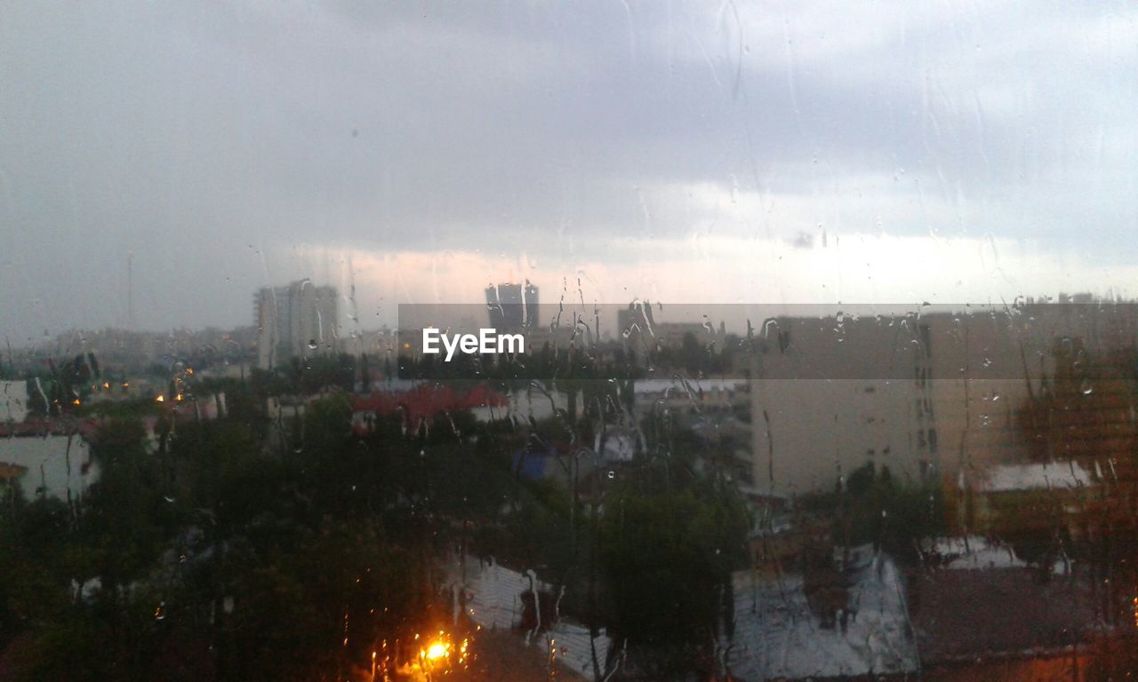 CITY BUILDINGS AGAINST SKY