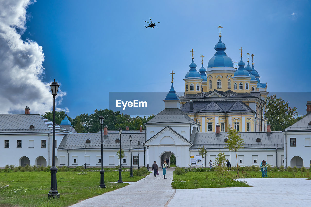 VIEW OF BUILDINGS AGAINST BLUE SKY