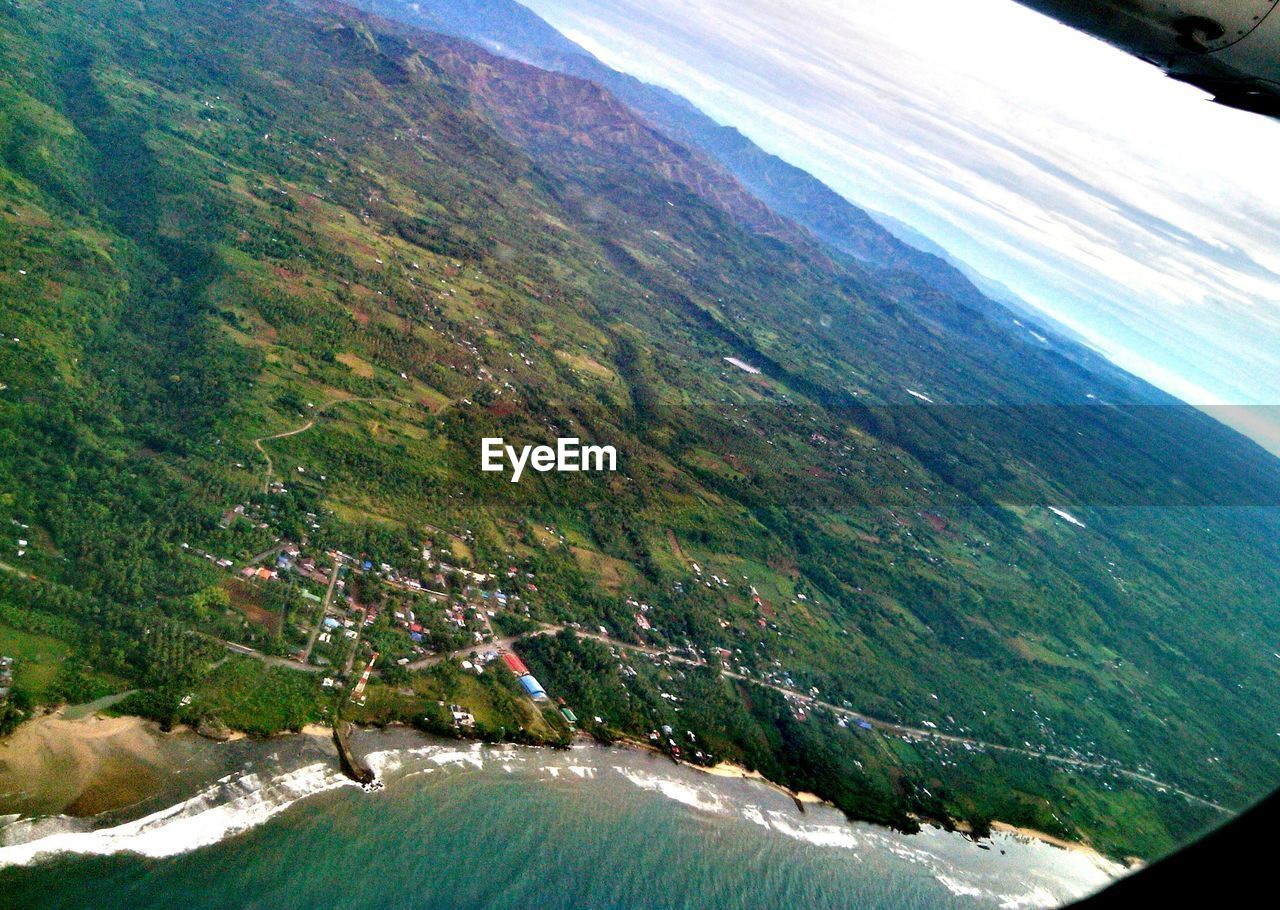 Arial view of landscape through airplane window