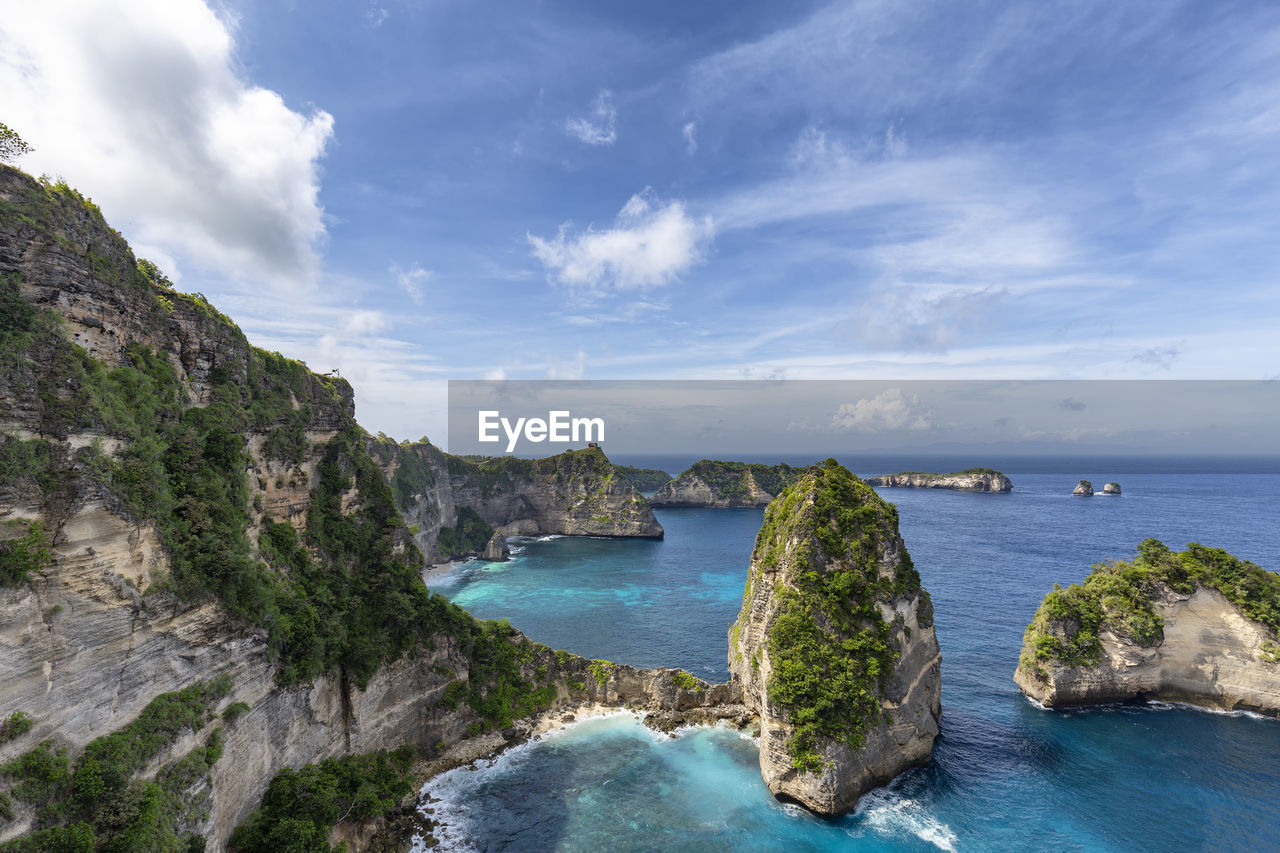 Scenic view of sea against blue sky