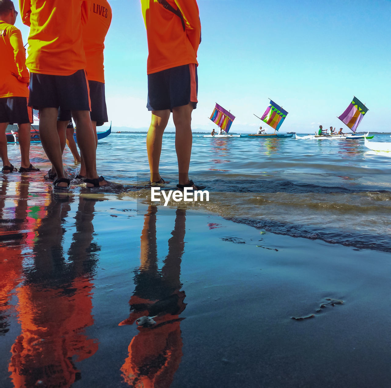 LOW SECTION OF PEOPLE AT BEACH