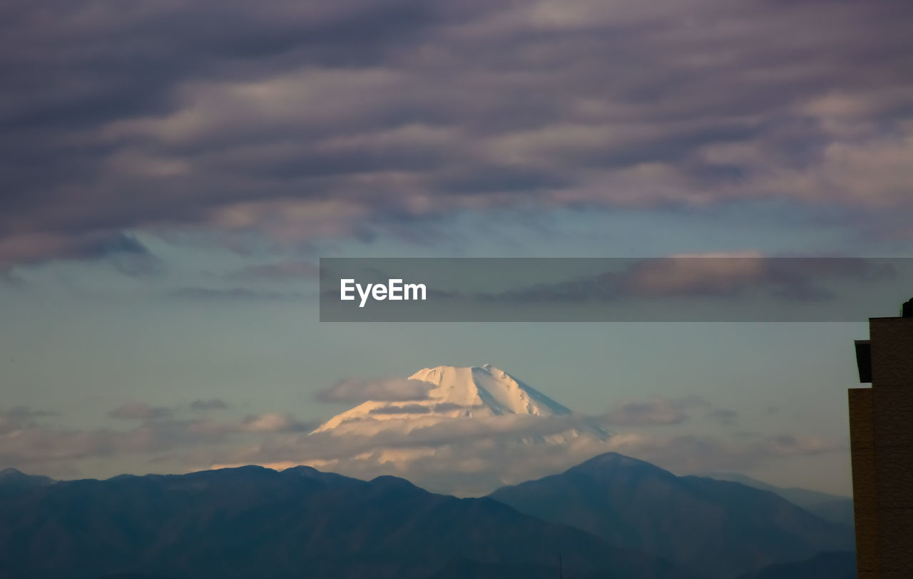 Scenic view of mountains against sky during sunset