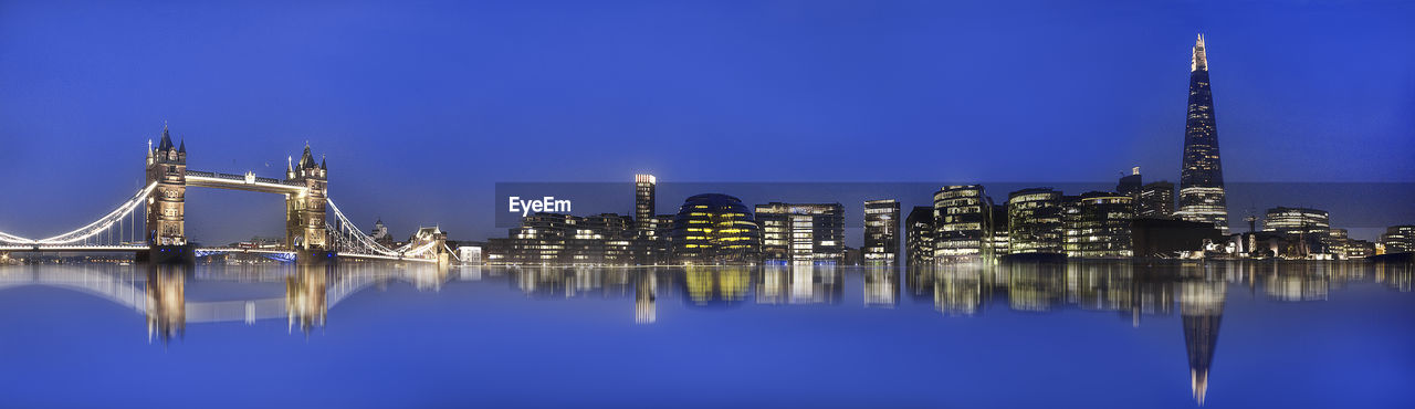 Reflection of illuminated buildings in water