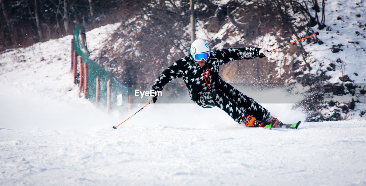 PERSON SKIING IN SNOW