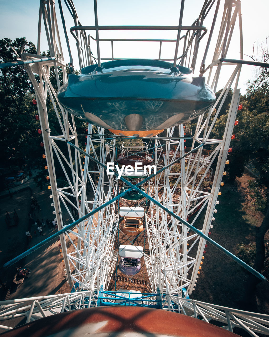 Low angle view of ferris wheel against sky