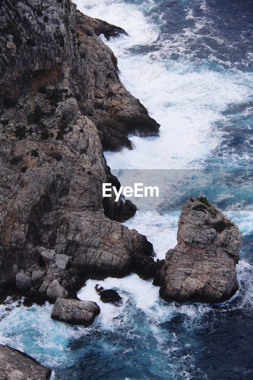 ROCK FORMATIONS AT SEA SHORE