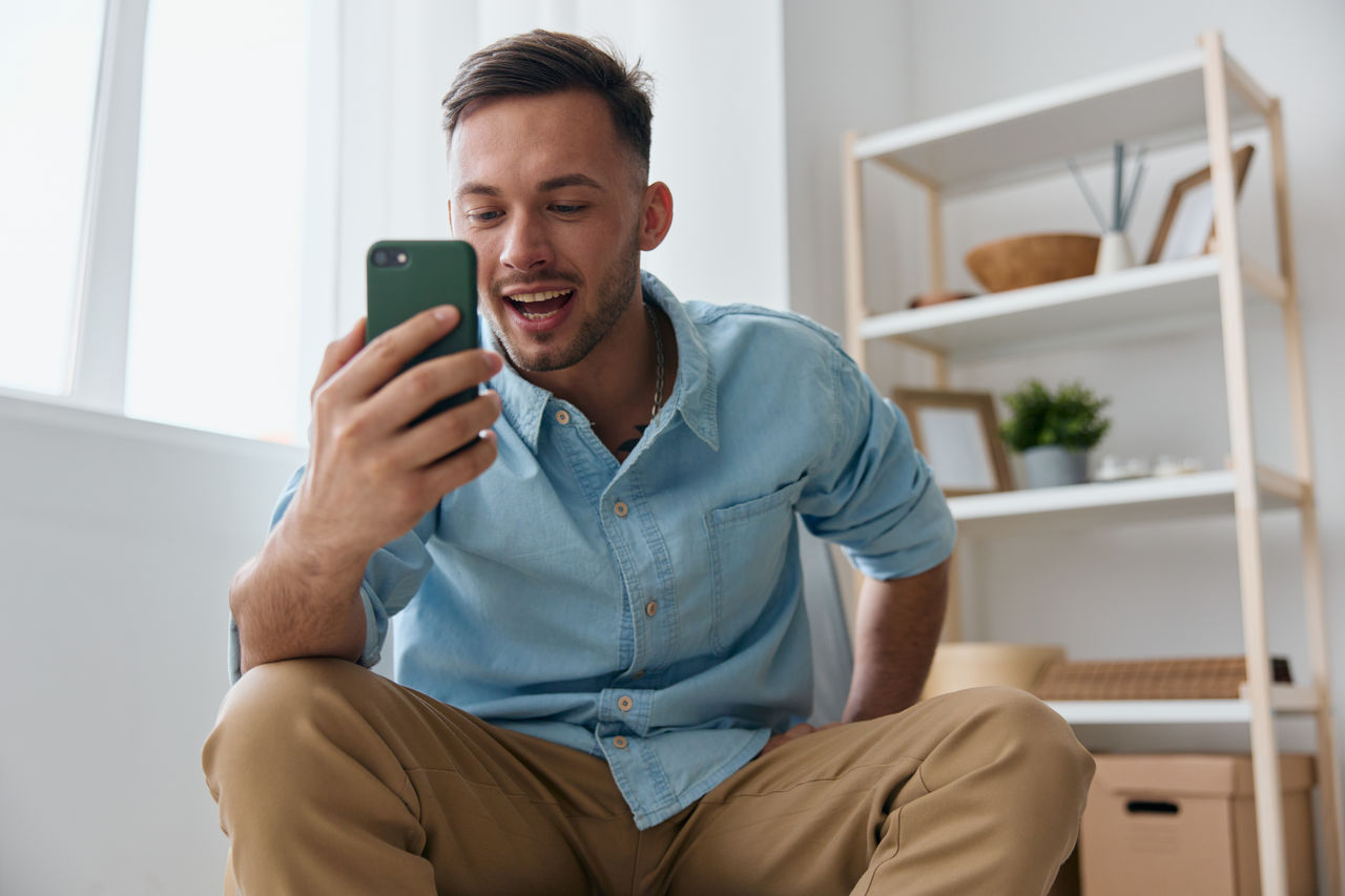 young man using mobile phone