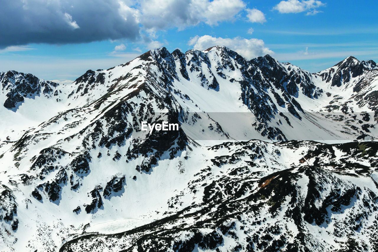 Grześ, Rakoń & Wołowiec. Polish Tatras during the end of winter. Mountain Winter Mountains Tatras Polish Tatra National Park Sky Cloud - Sky Scenics - Nature Snow Beauty In Nature Winter Cold Temperature Snowcapped Mountain Tranquil Scene Tranquility Mountain Range Day White Color Non-urban Scene Nature Environment Landscape No People Outdoors Mountain Peak