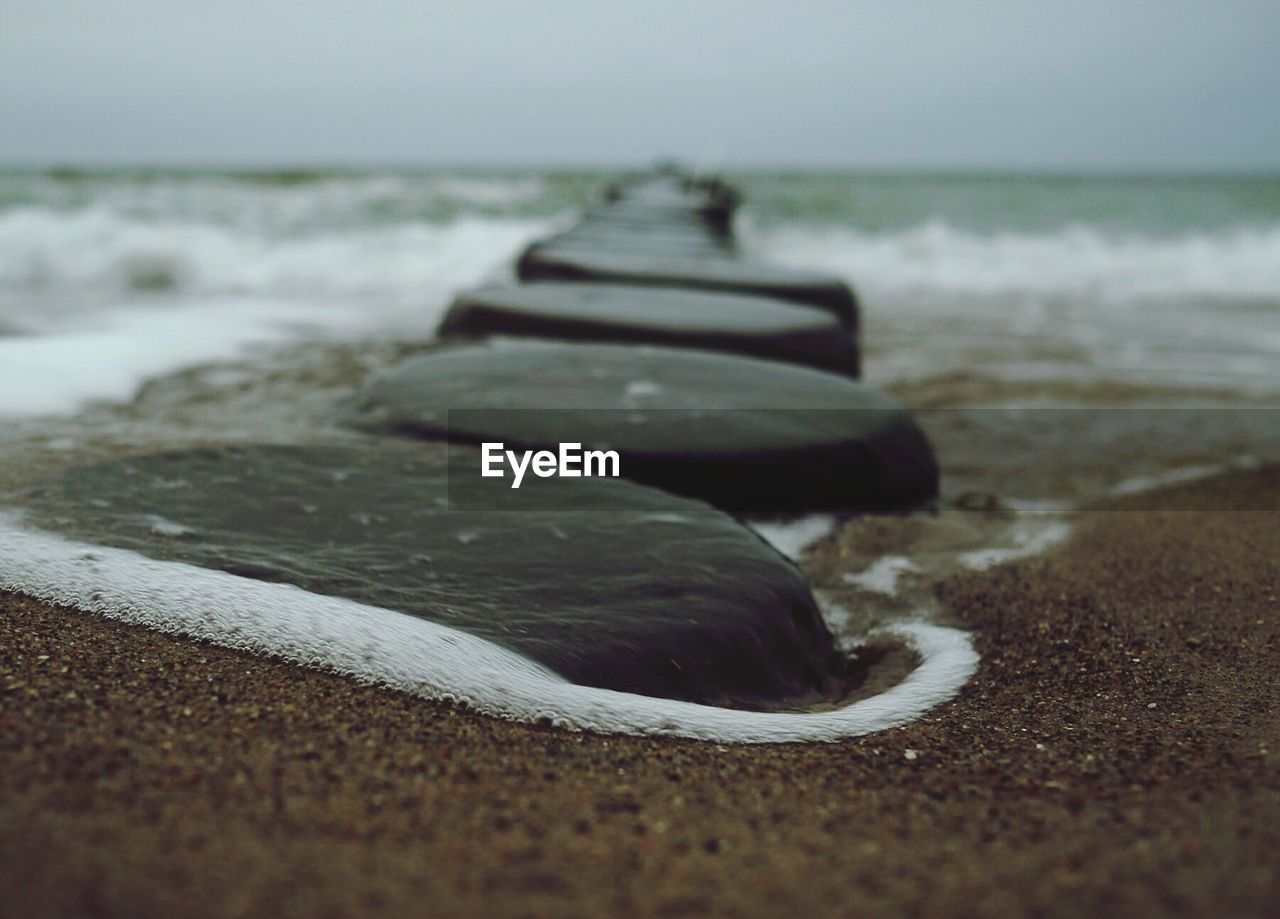 Stone pier at beach