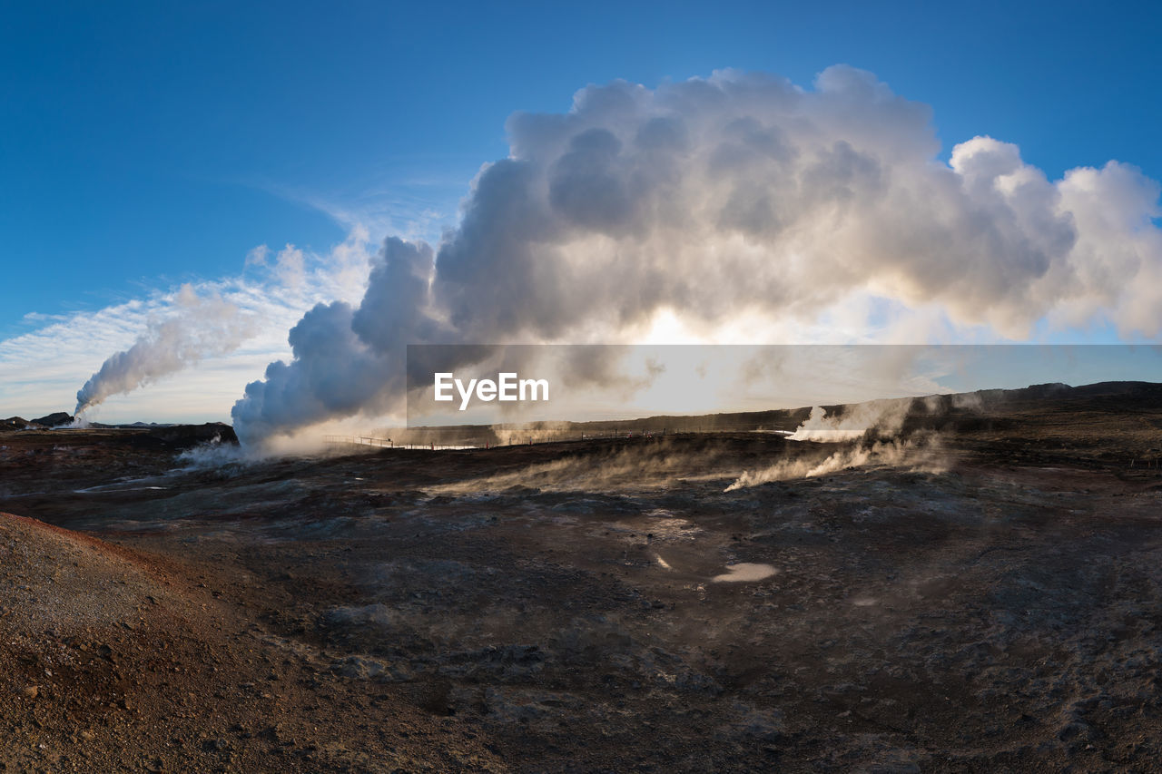 SMOKE EMITTING FROM VOLCANIC LANDSCAPE