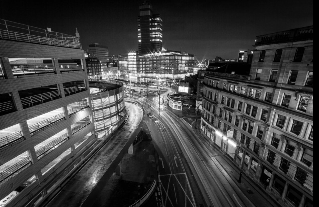 High angle view of illuminated cityscape at night