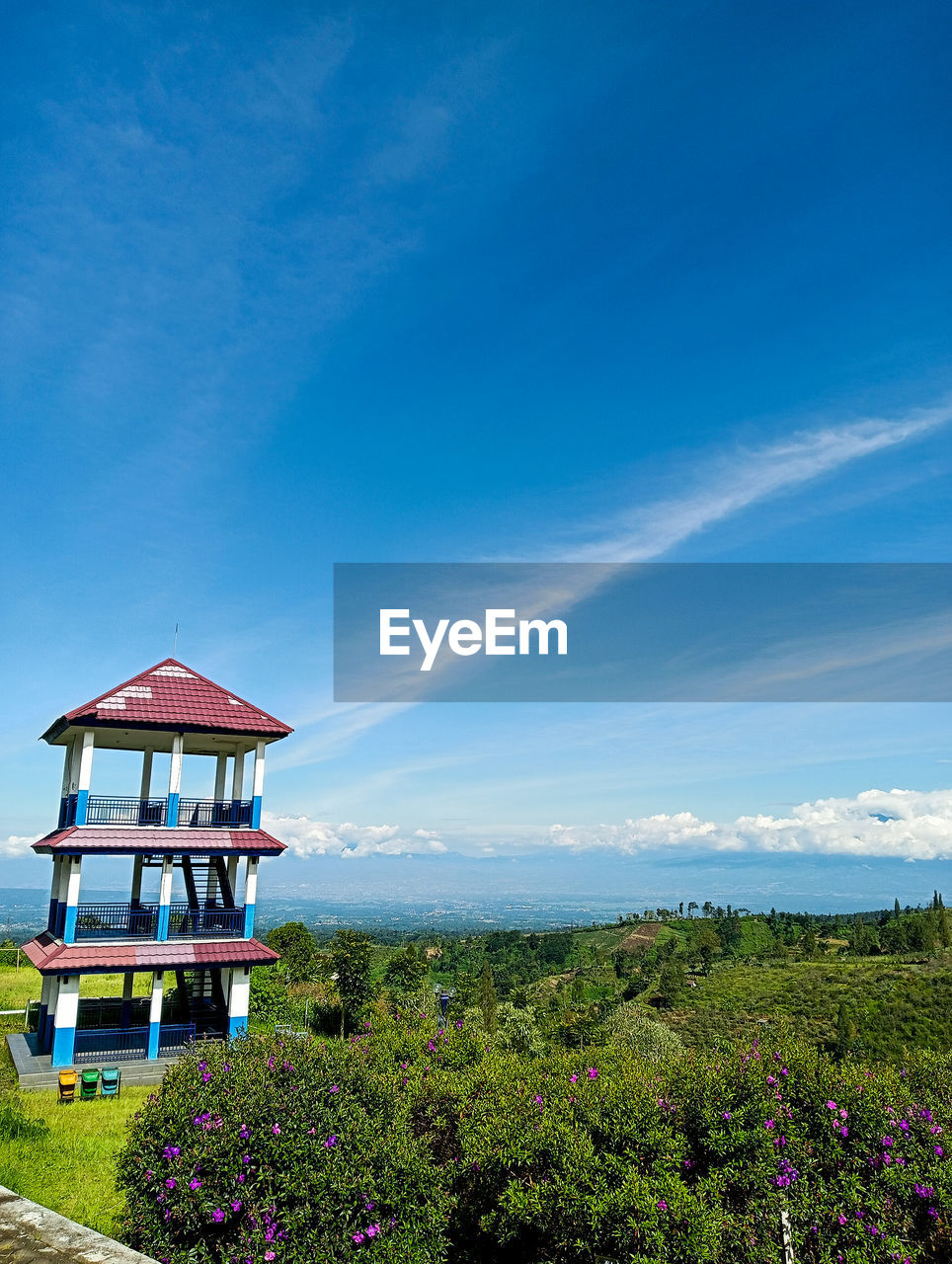 sky, architecture, built structure, horizon, nature, plant, building exterior, blue, building, beauty in nature, scenics - nature, cloud, landscape, land, environment, no people, flower, travel destinations, mountain, outdoors, travel, tranquility, tourism, day, house, hut, water, tree, tranquil scene, summer, sea, tower, residential district, non-urban scene, rural scene