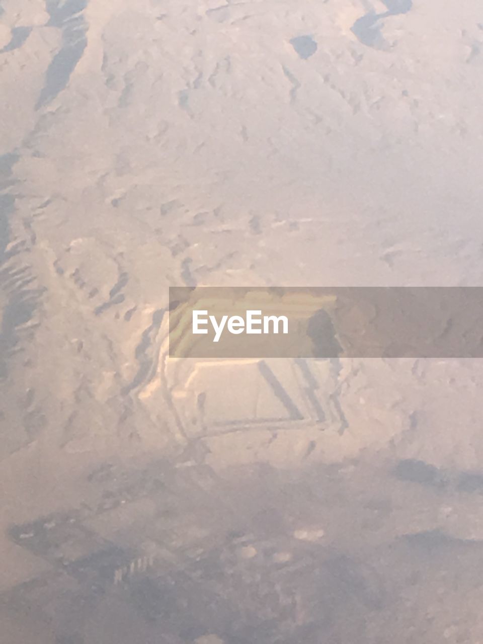 HIGH ANGLE VIEW OF SAND ON BEACH