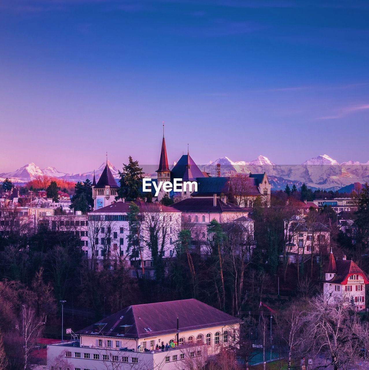 Cityscape against blue sky