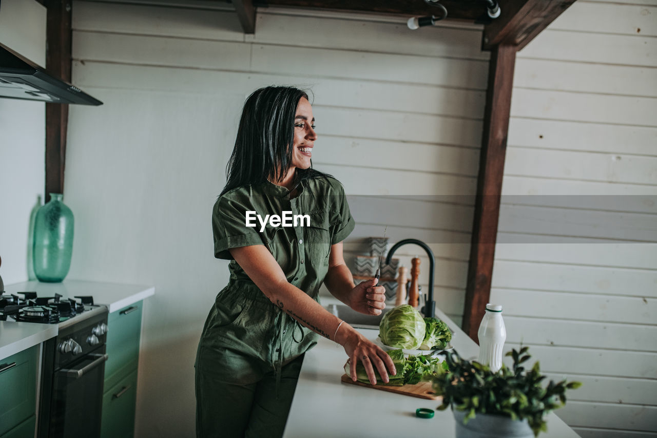 Woman standing at home