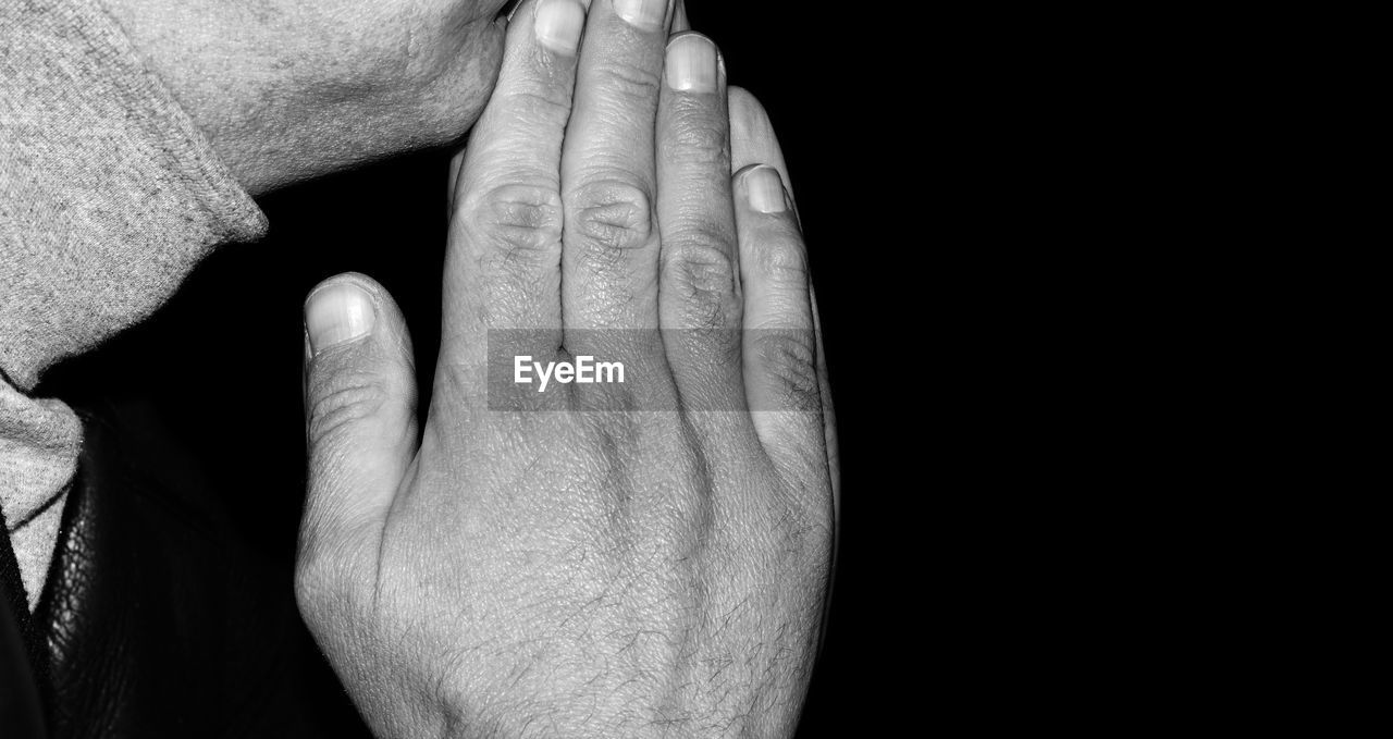 black and white, hand, finger, arm, monochrome photography, monochrome, one person, close-up, limb, black background, adult, black, studio shot, indoors, men, human leg, lifestyles