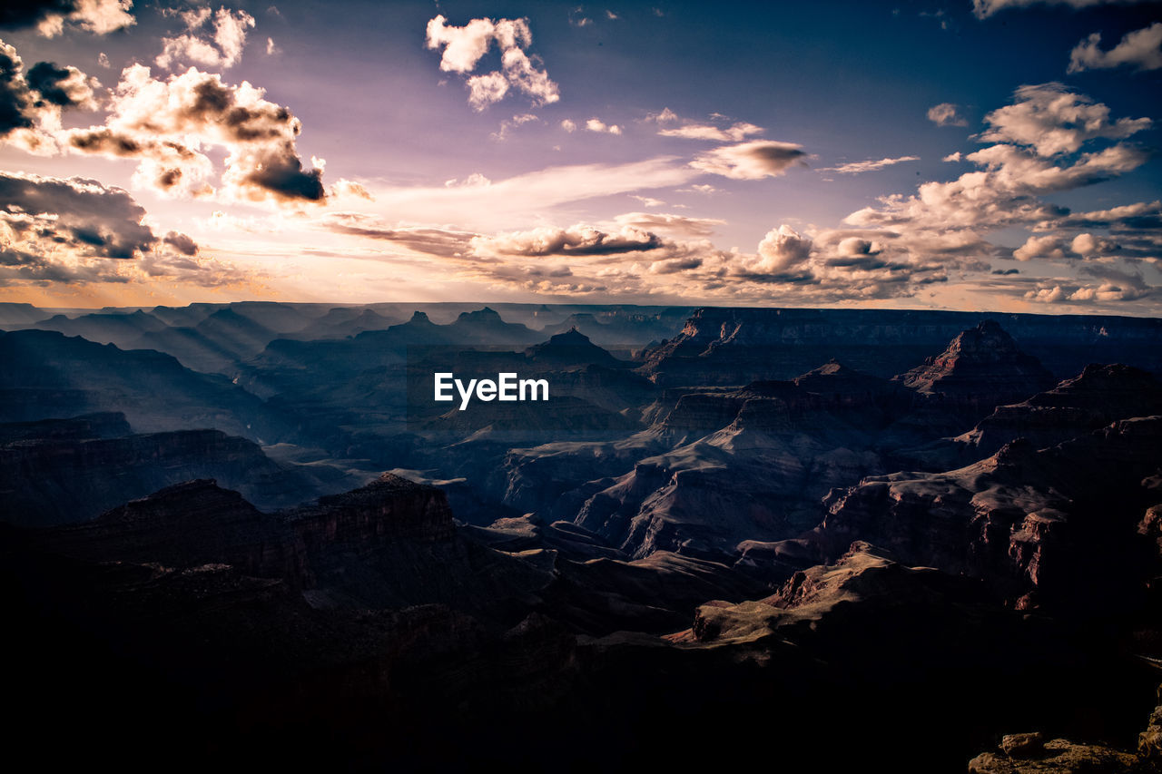 Aerial view of landscape against sky during sunset