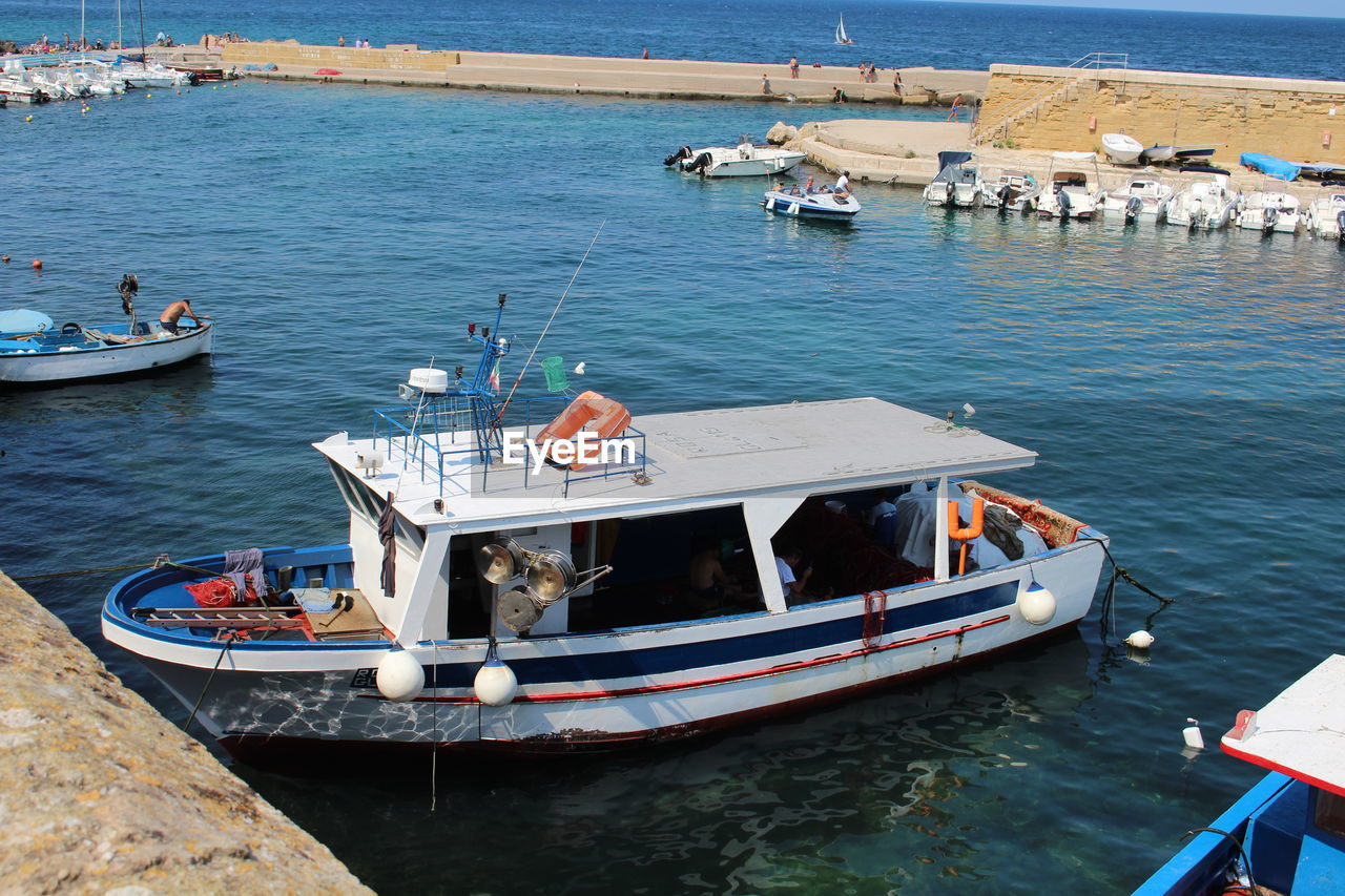 High angle view of boats moored in sea