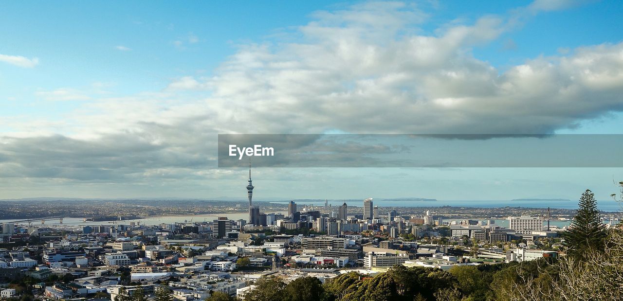 View of city against cloudy sky