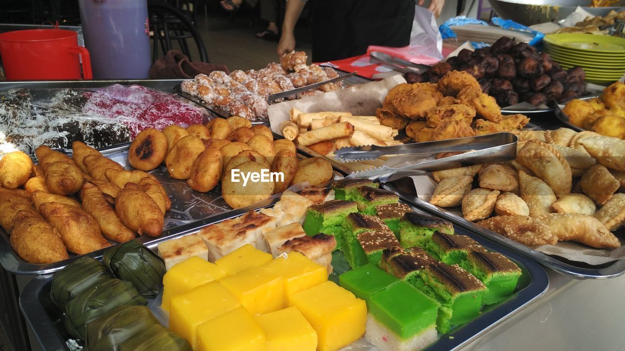 Various types of food on display at market