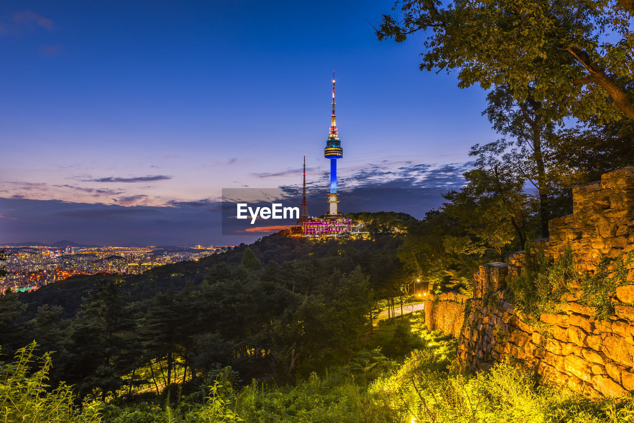 Scenic view of mountains against blue sky