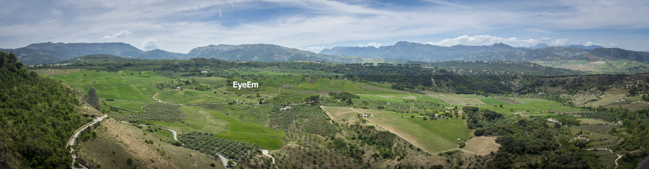 landscape, environment, scenics - nature, land, mountain, mountain range, nature, beauty in nature, sky, plant, rural scene, agriculture, field, panoramic, valley, cloud, tree, mountain pass, tranquility, travel, social issues, no people, green, aerial photography, crop, outdoors, environmental conservation, farm, travel destinations, architecture, tranquil scene, plateau, forest, ridge, building, tourism, hill station, non-urban scene, rural area, grass, food and drink, summer, day, idyllic, fog, growth, village, tropical climate