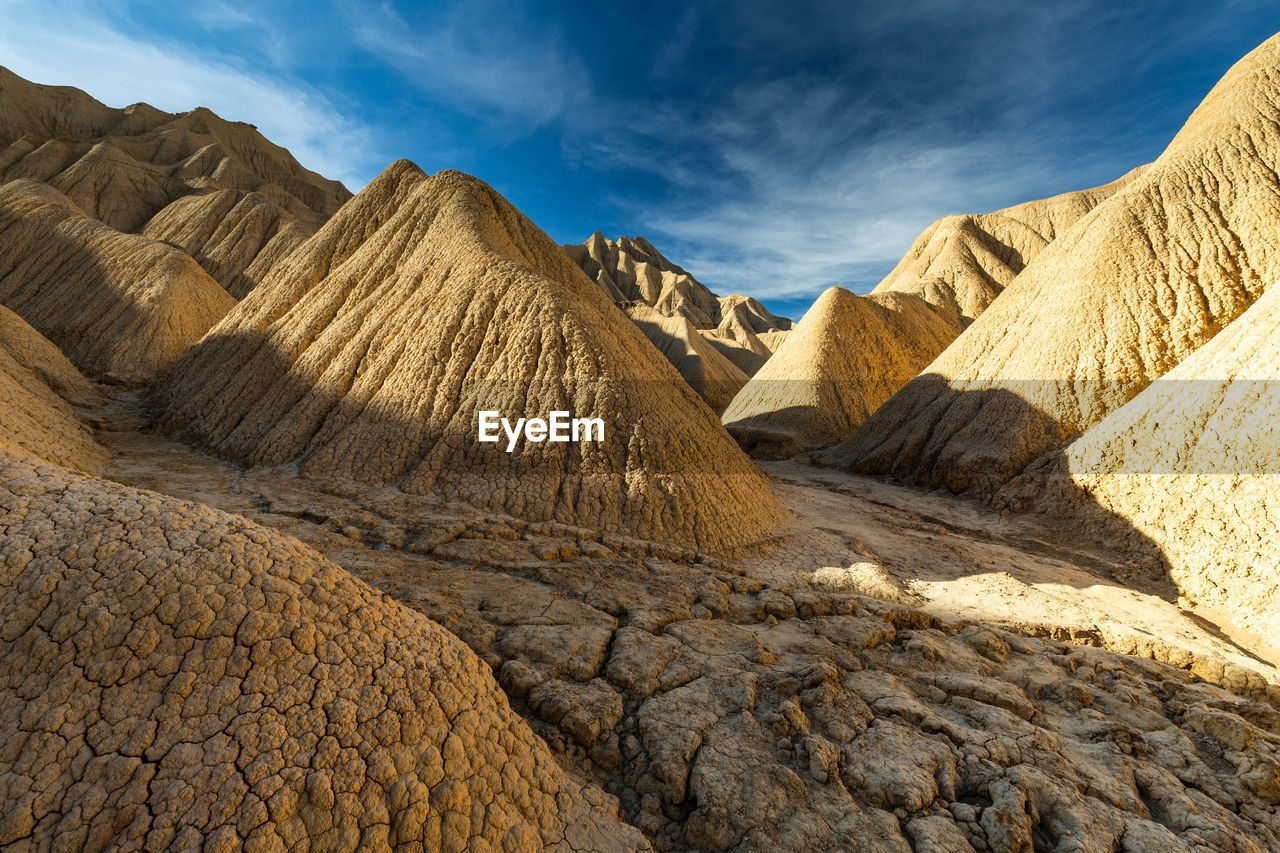 Scenic view of rocky mountains against sky