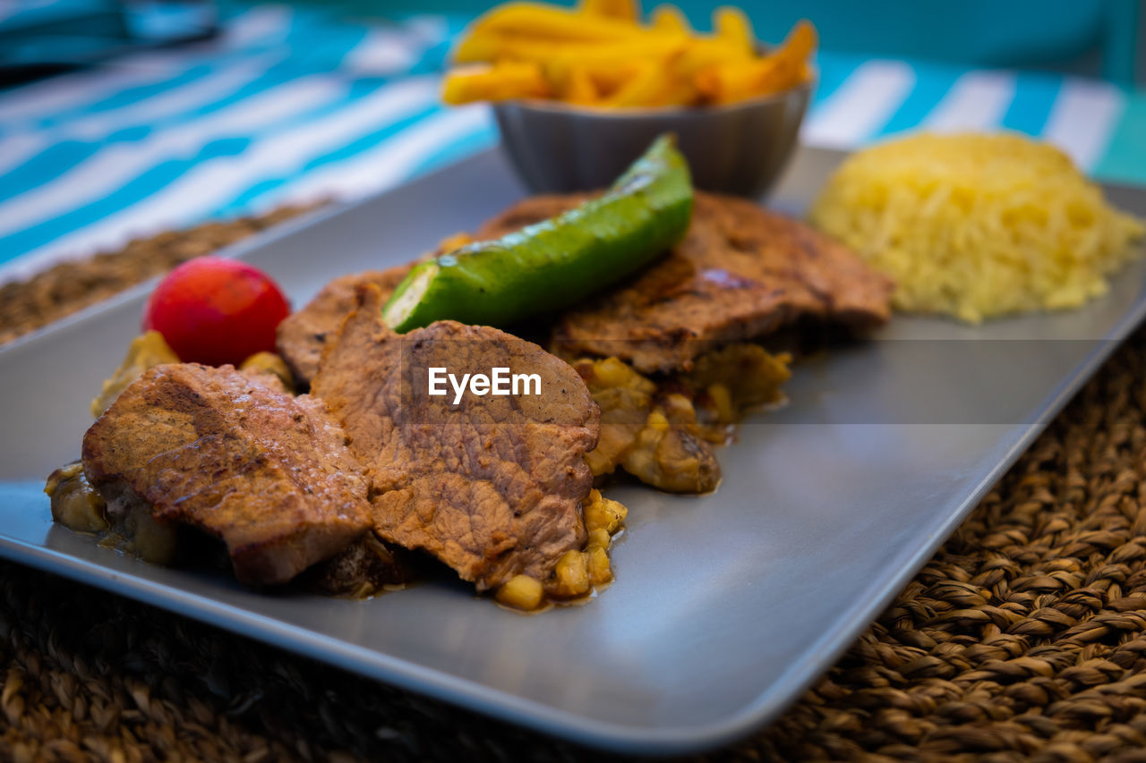 CLOSE-UP OF FOOD SERVED IN PLATE