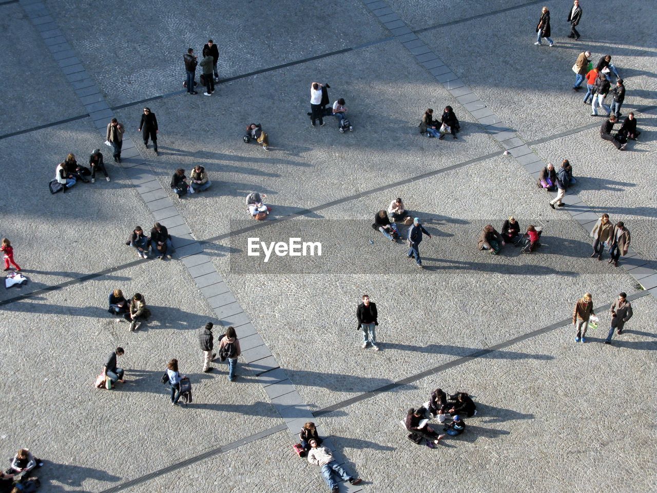 High angle view of people at town square