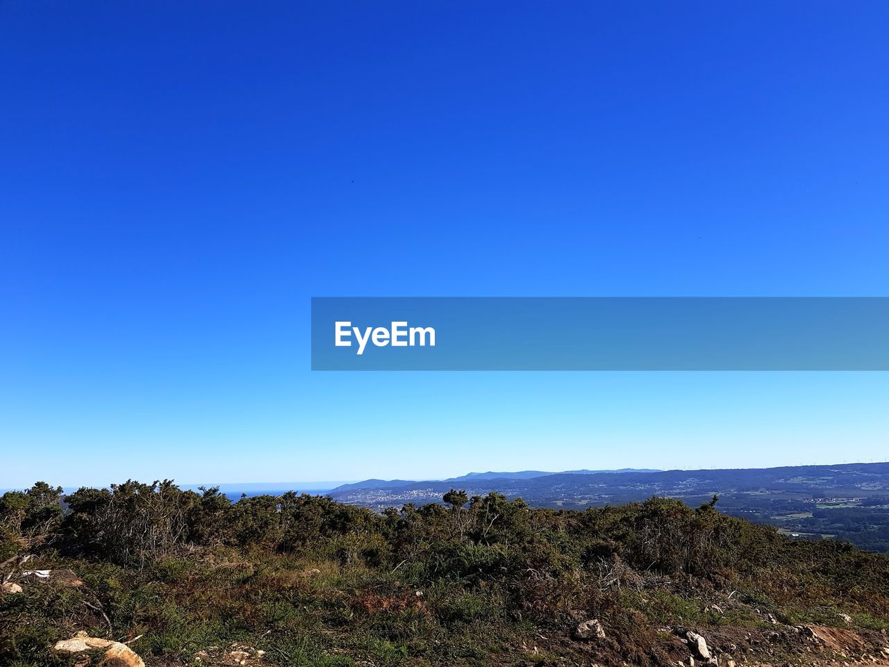 LANDSCAPE AGAINST CLEAR BLUE SKY