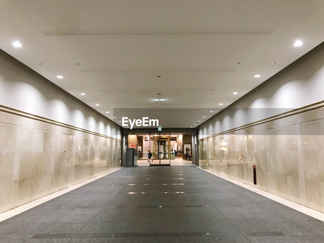 EMPTY ILLUMINATED CORRIDOR