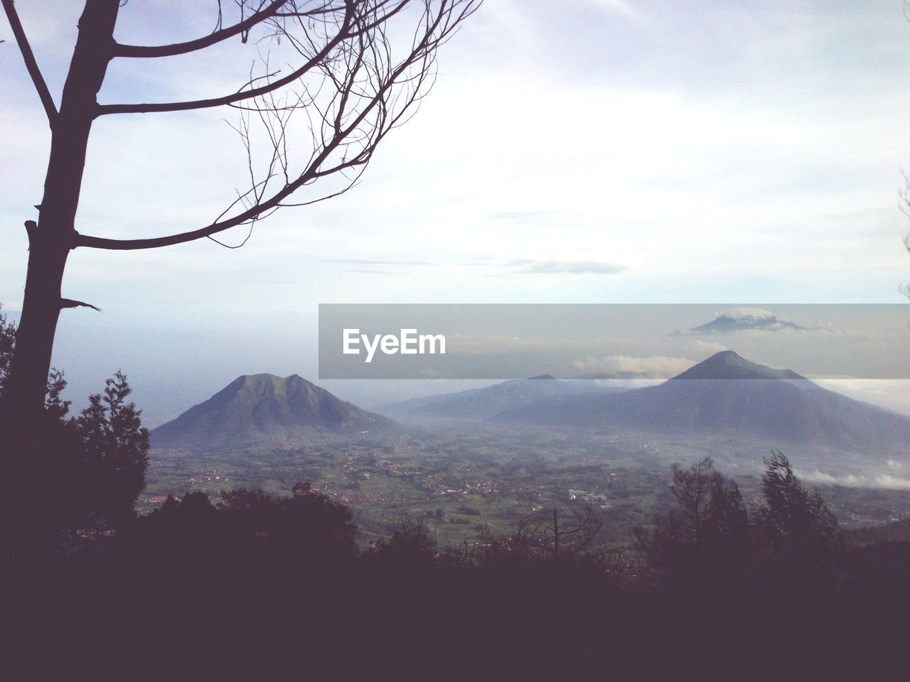 Tranquil view of mountains and sky