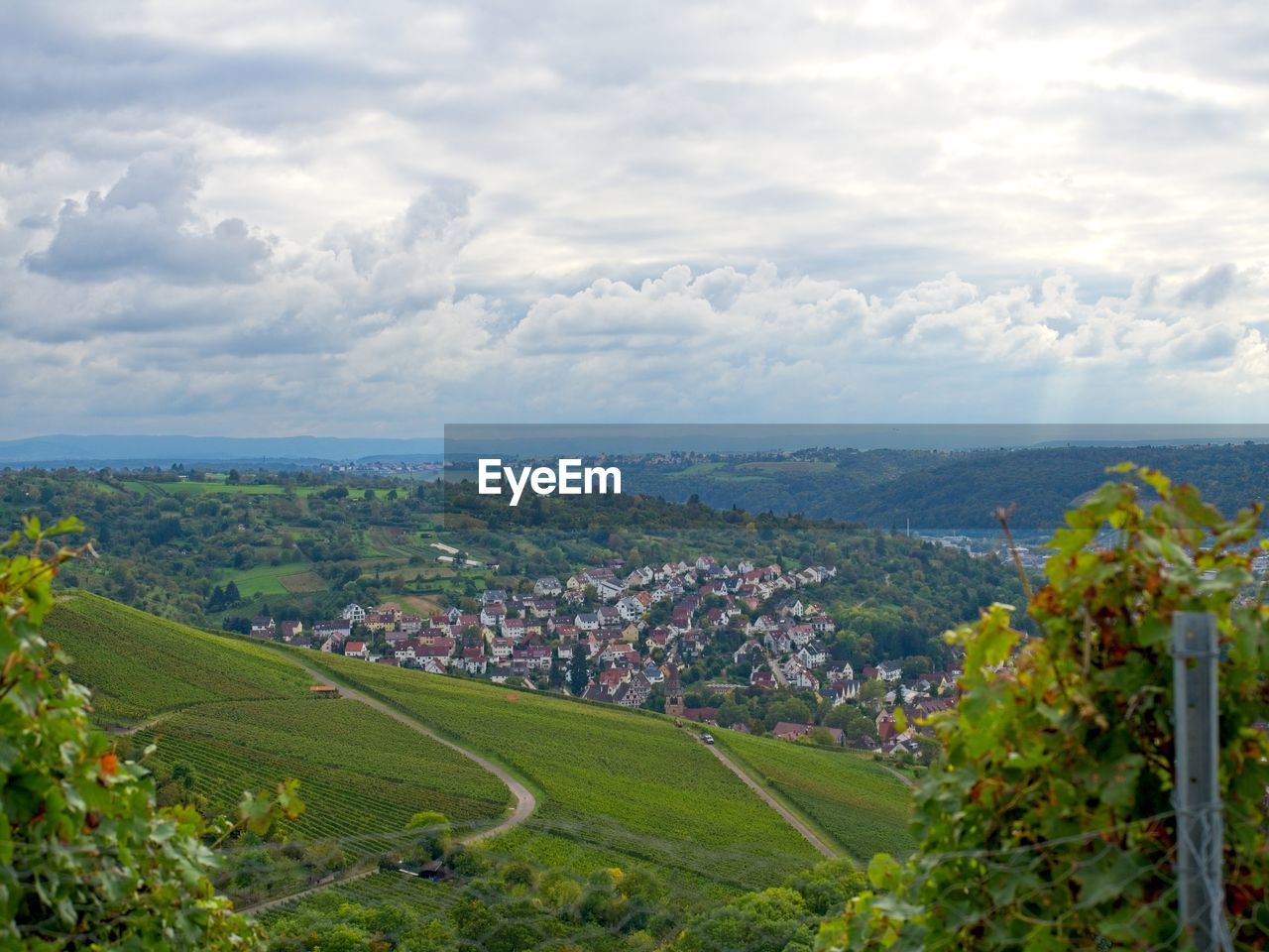 AERIAL VIEW OF TOWNSCAPE AGAINST SKY IN CITY