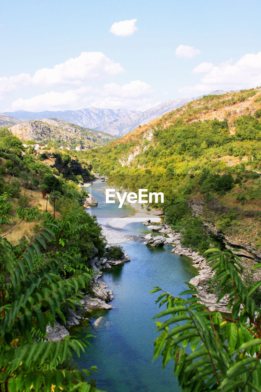 SCENIC VIEW OF RIVER AGAINST SKY