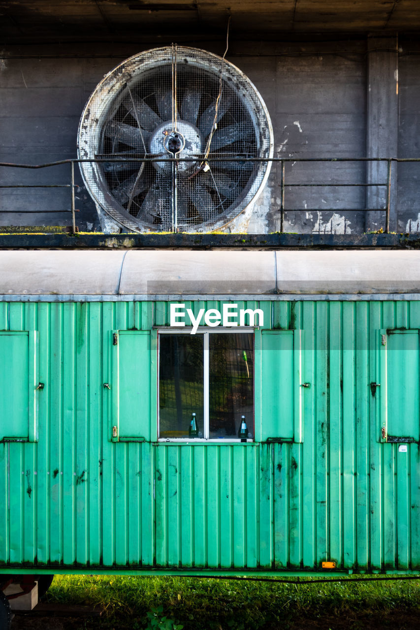 View of abandoned building with closed door