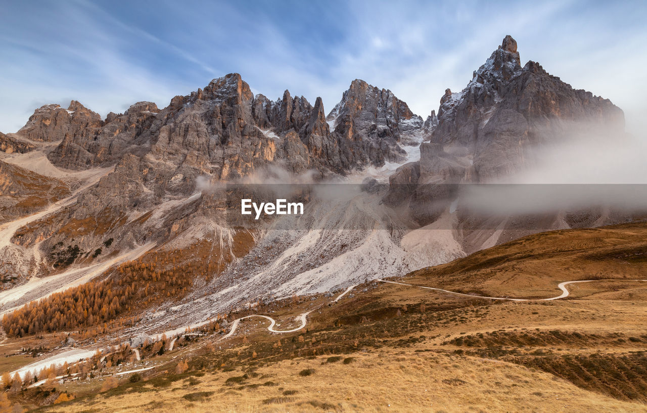 Panoramic view of landscape and mountains against sky in dolomites mountains 