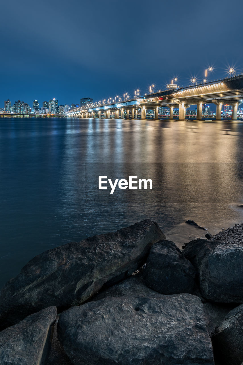 scenic view of sea against clear sky at night