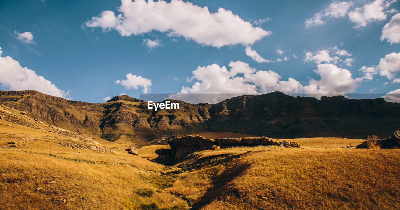 Panoramic view of landscape and mountains against sky