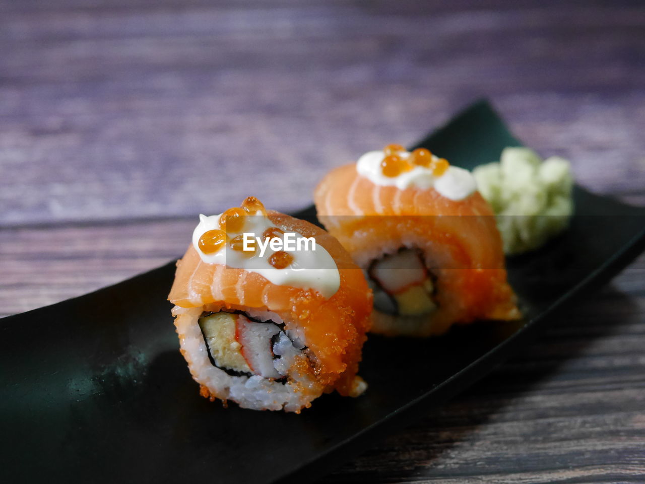 Close-up of sushi served on table