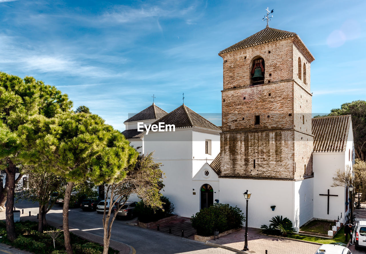 BELL TOWER AGAINST SKY