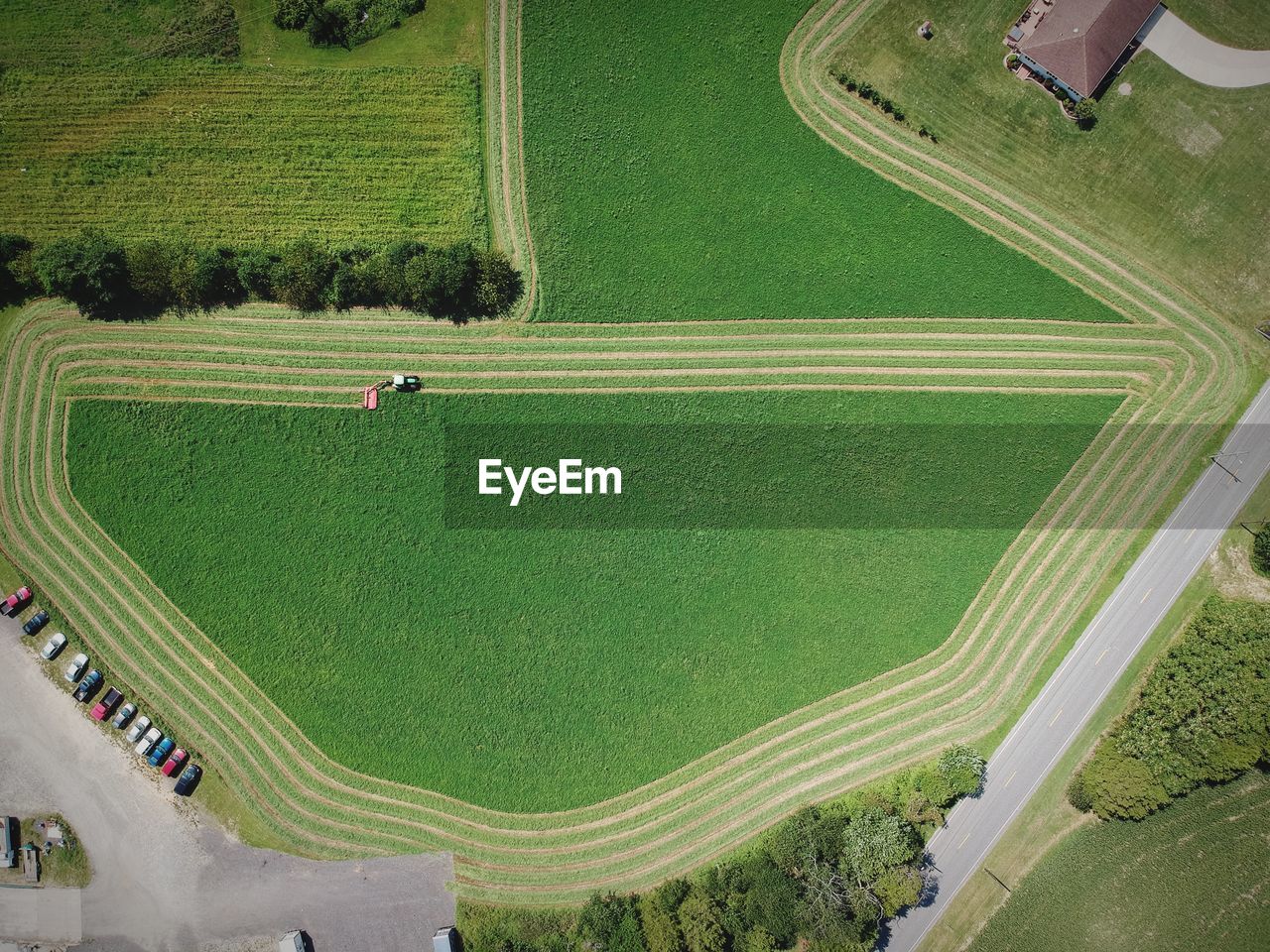 Aerial view of agricultural machinery on field