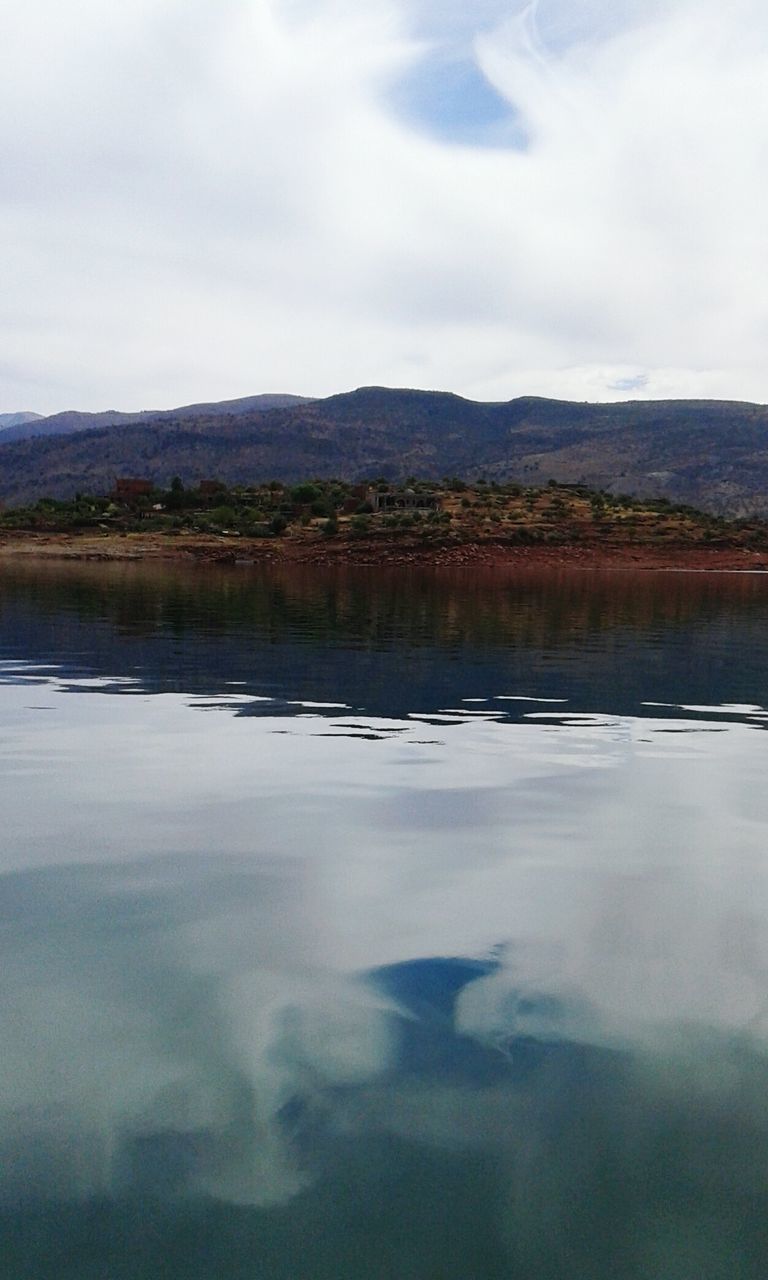 SCENIC VIEW OF LAKE AND MOUNTAINS