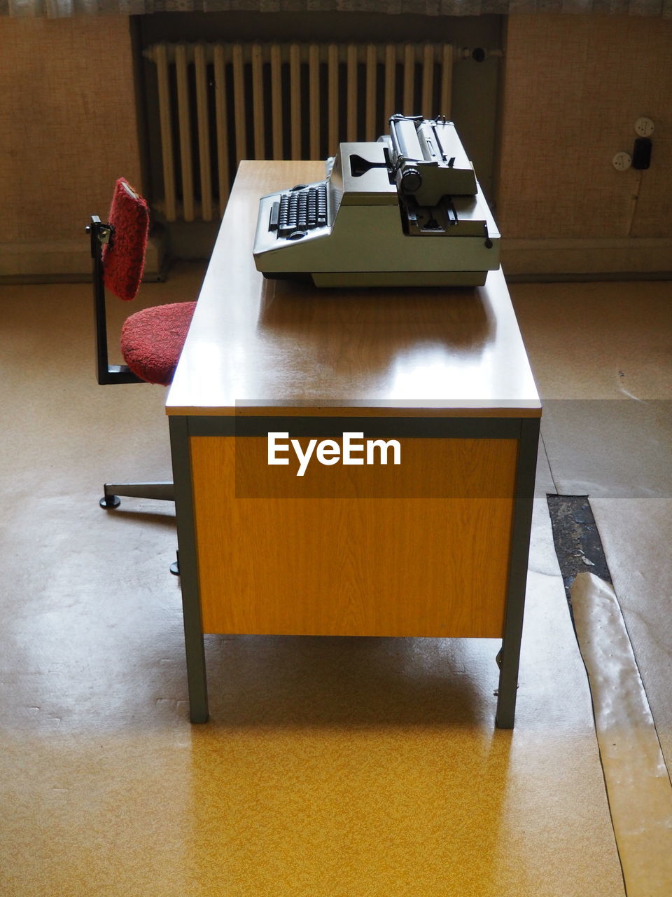 Typewriter on table in room at prison